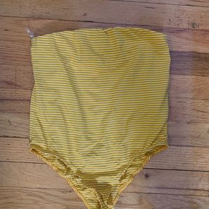 yellow and white body suit